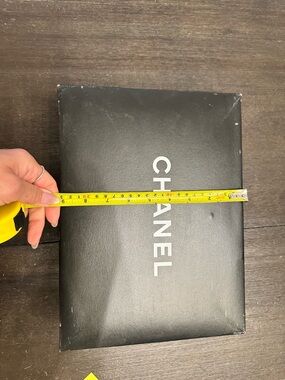 CHANEL Black Box with White Logo and Measuring Tape Accent